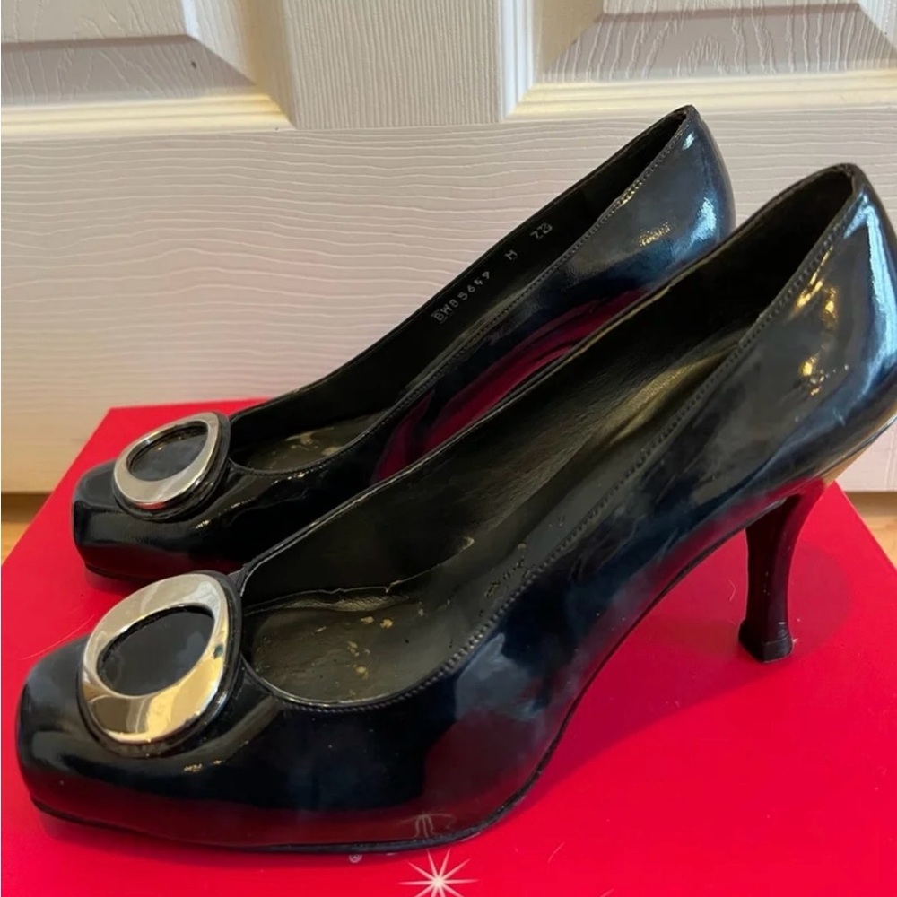 Stuart Weitzman pumps. Dark blue patent leather with silver accents, size 7 1/2